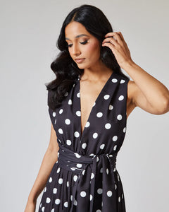 BLACK AND WHITE POLKA DOT JUMPSUIT WITH PLEATED TROUSER AND MULTIWAY BODICE