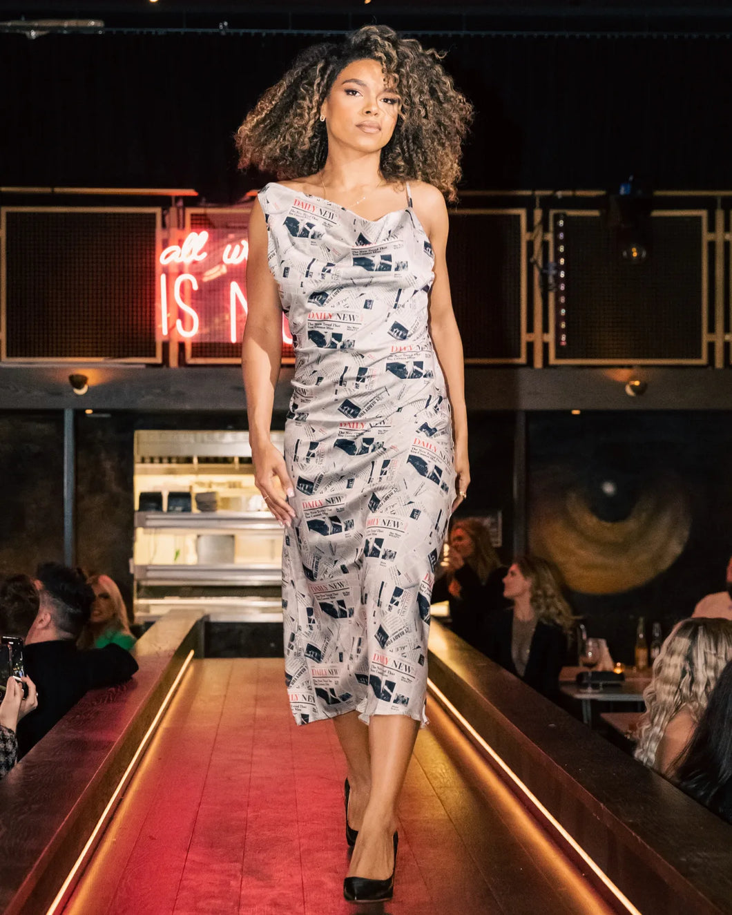 NEWSPAPER PRINT SATIN MIDI SLIP DRESS WITH ASYMMETRIC NECKLINE Arelia's Dream NEWSPAPER PRINT SATIN MIDI SLIP DRESS WITH ASYMMETRIC NECKLINE Arelia's Dream