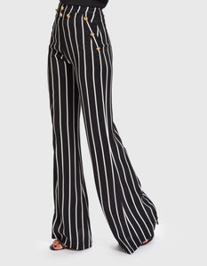 CORINE STRIPED FLARED TROUSERS