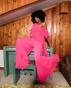 PINK PLISSE RUFFLE JUMPSUIT WITH ASYMMETRIC NECKLINE