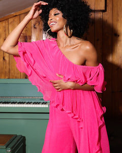 PINK PLISSE RUFFLE JUMPSUIT WITH ASYMMETRIC NECKLINE