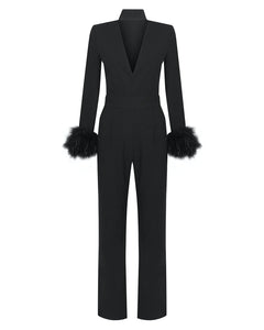 LIMITED EDITION BLACK JUMPSUIT WITH FUR CUFFS AND COLLAR DETAIL