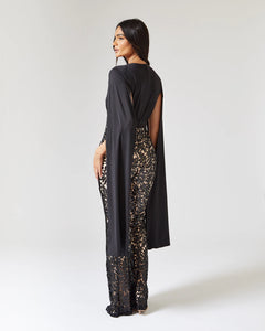 BLACK CAPE SLEEVE JUMPSUIT WITH SEQUIN TROUSER AND CONTRAST NUDE LINING