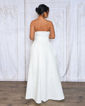 Load image into Gallery viewer, WHITE TAILORED JUMPSUIT WITH DETACHABLE SKIRT AND BOW BELT