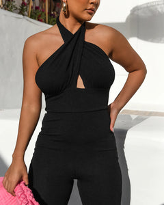 BLACK RIBBED HALTERNECK JUMPSUIT WITH CROSS FRONT